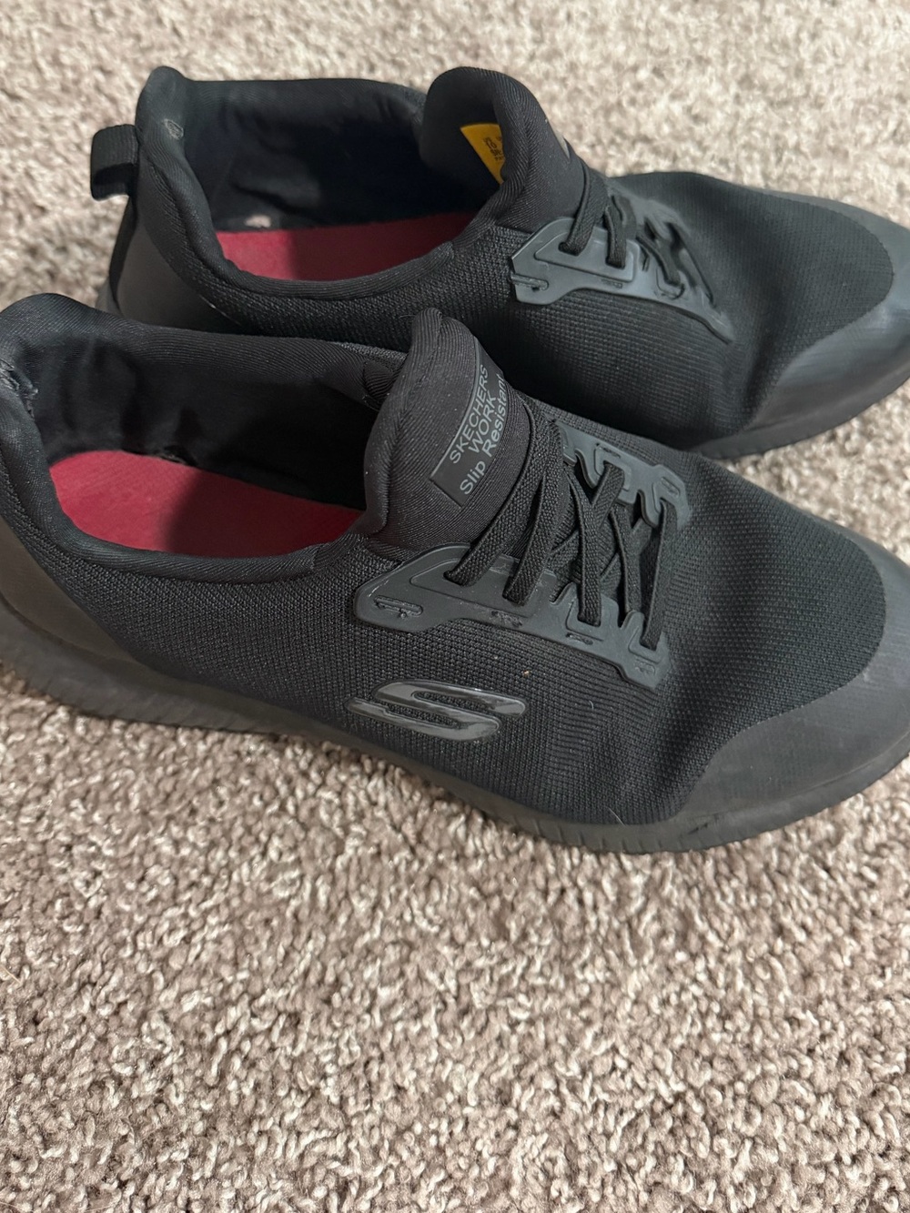 Skechers women’s Black Athletic Slip-On Sneakers with Red Insoles size 10
